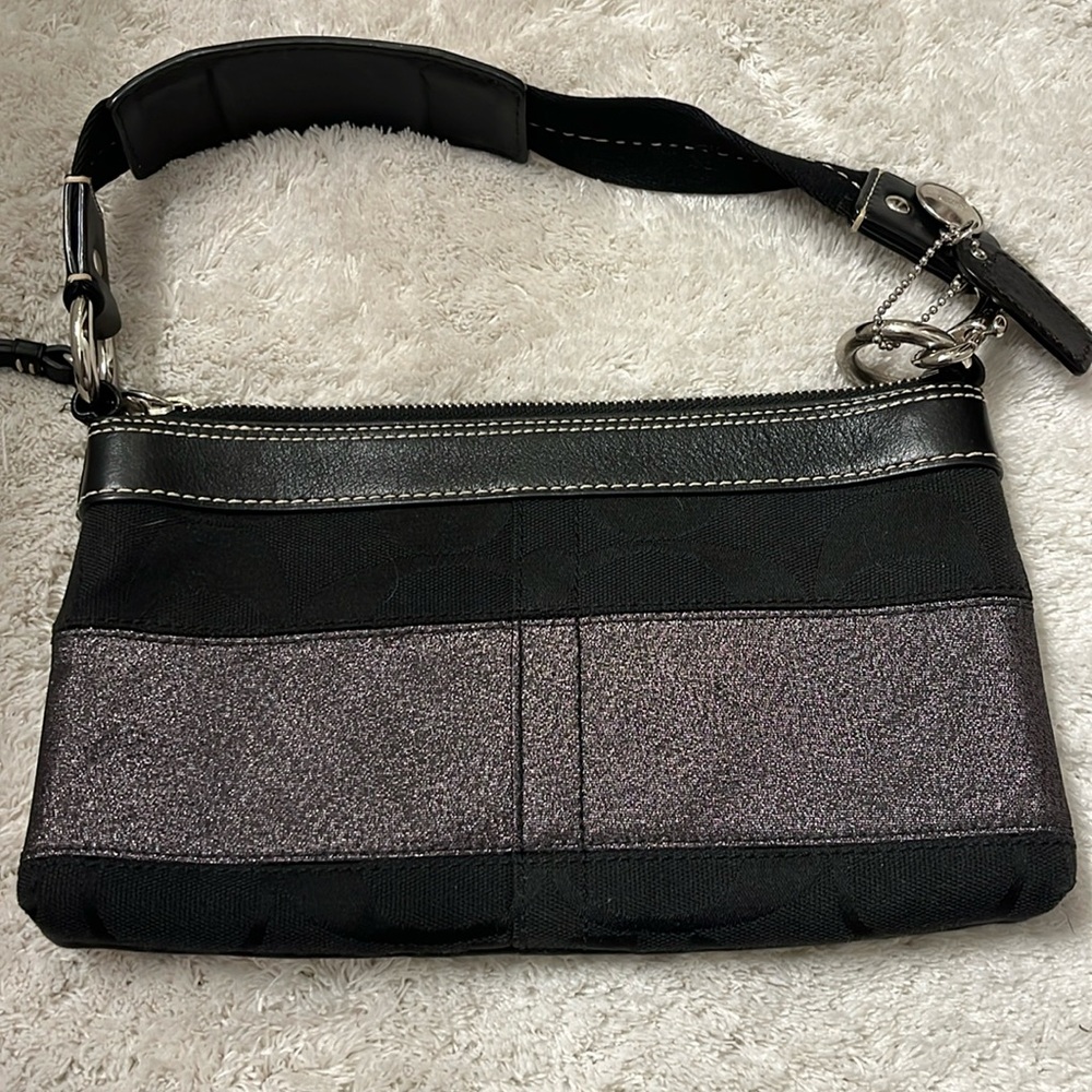 Black and silver coach purse